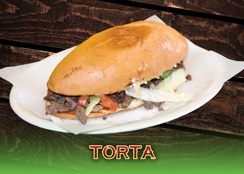Authentic Mexican torta with beef and fresh toppings