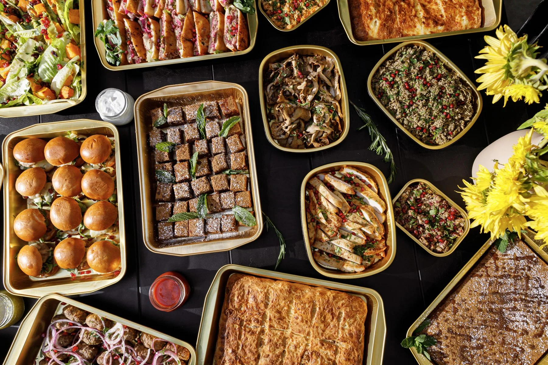 Brunch catering trays with sliders and pastries