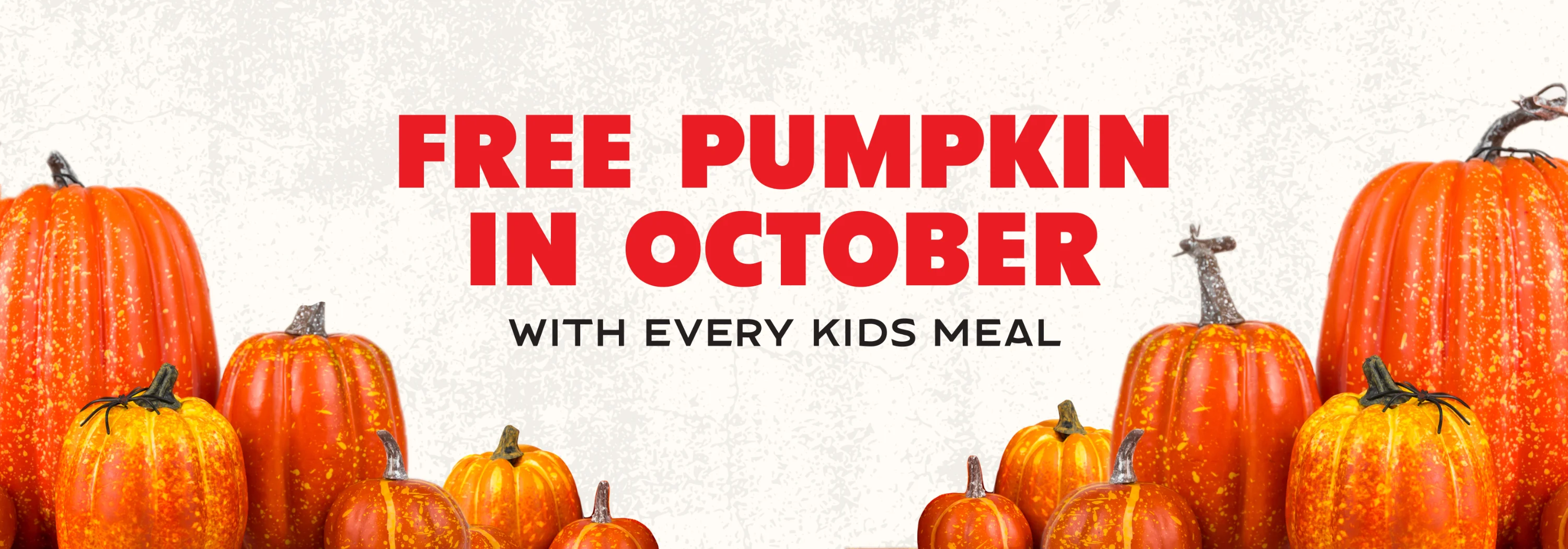Pumpkin-themed restaurant promotion offering free pumpkins with kids' meals