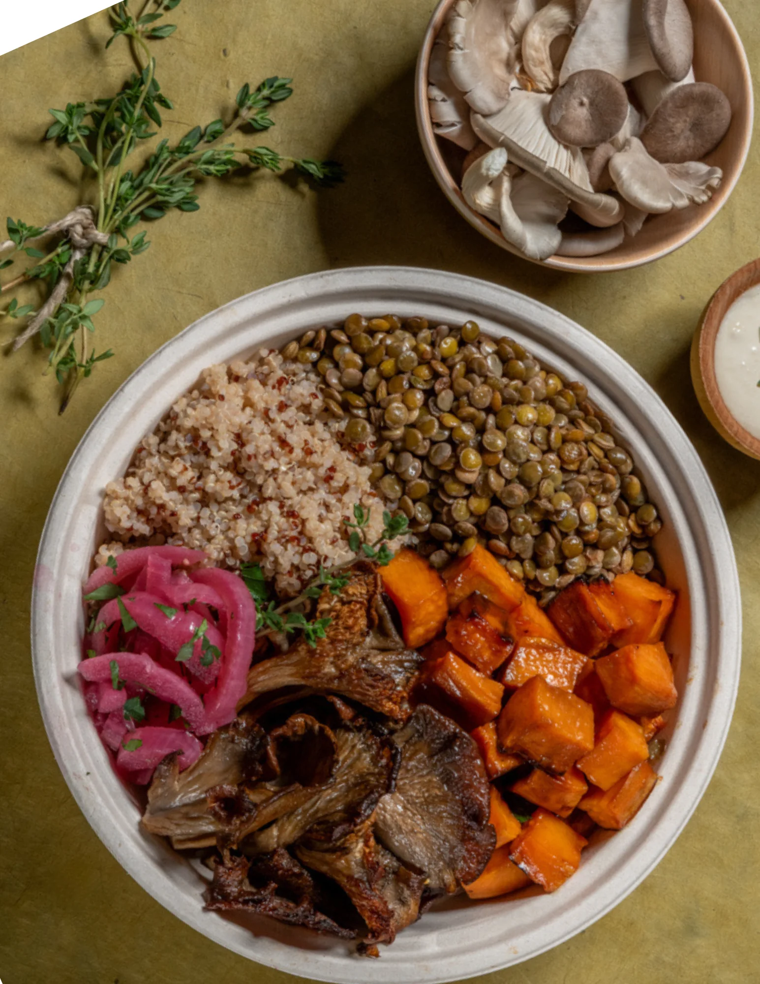 Vegan grain bowl with roasted vegetables and lentils