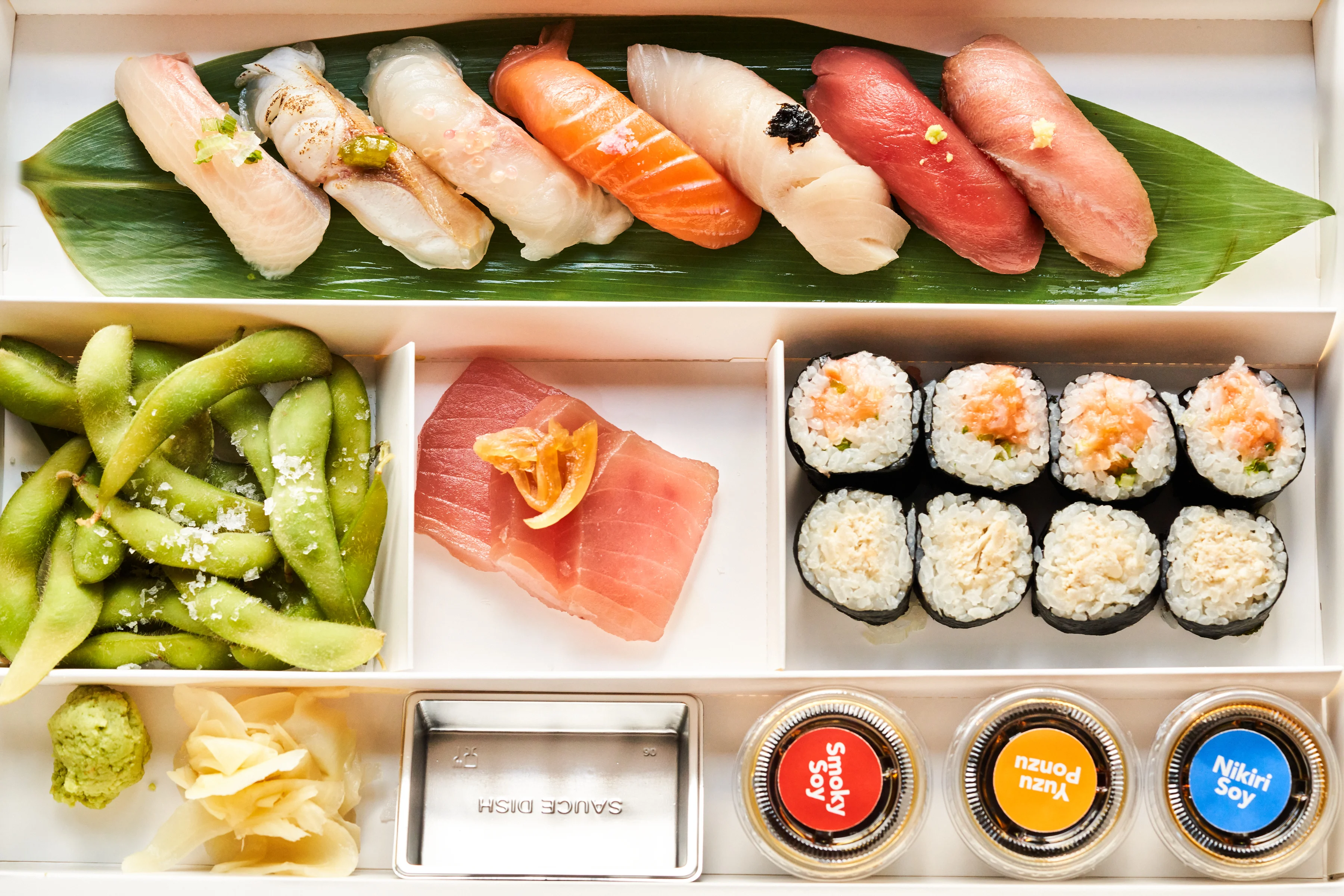 Japanese sushi bento box with assorted nigiri and rolls