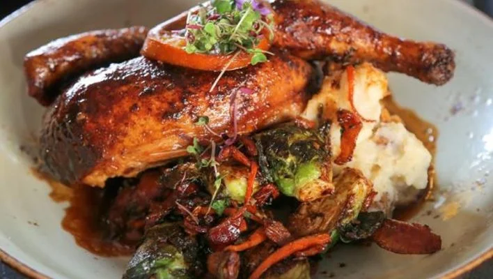 Herb-roasted chicken with seasonal vegetables