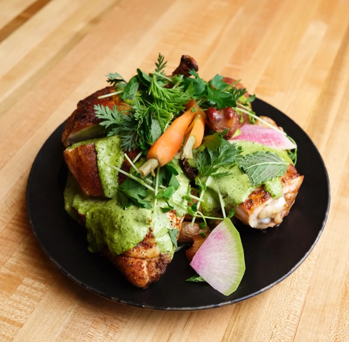 Delicious gourmet burger with fresh toppings on a wooden table