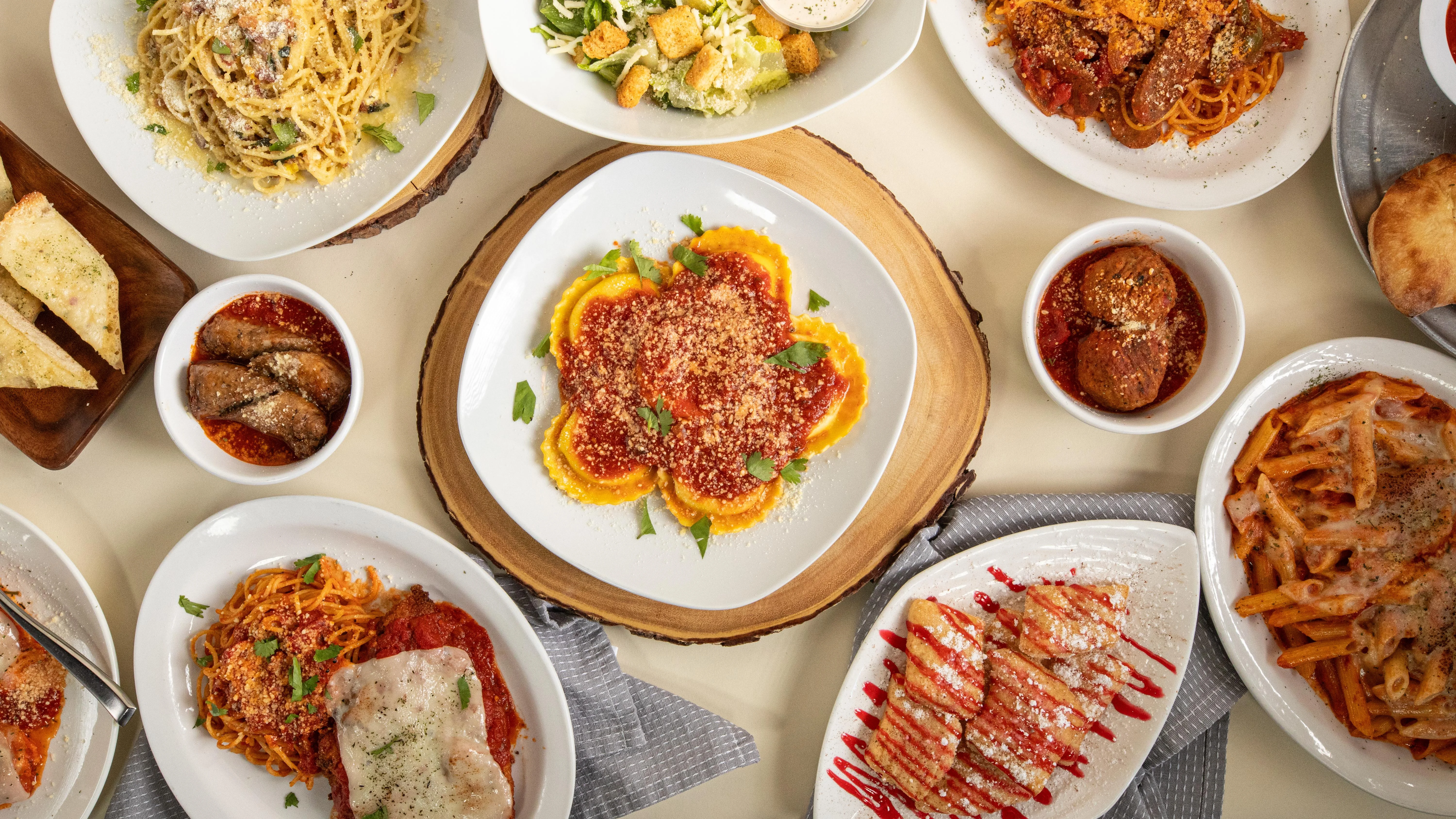 Italian pasta dishes including ravioli and spaghetti