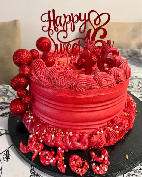 Vibrant red birthday cake for a sweet 16 celebration