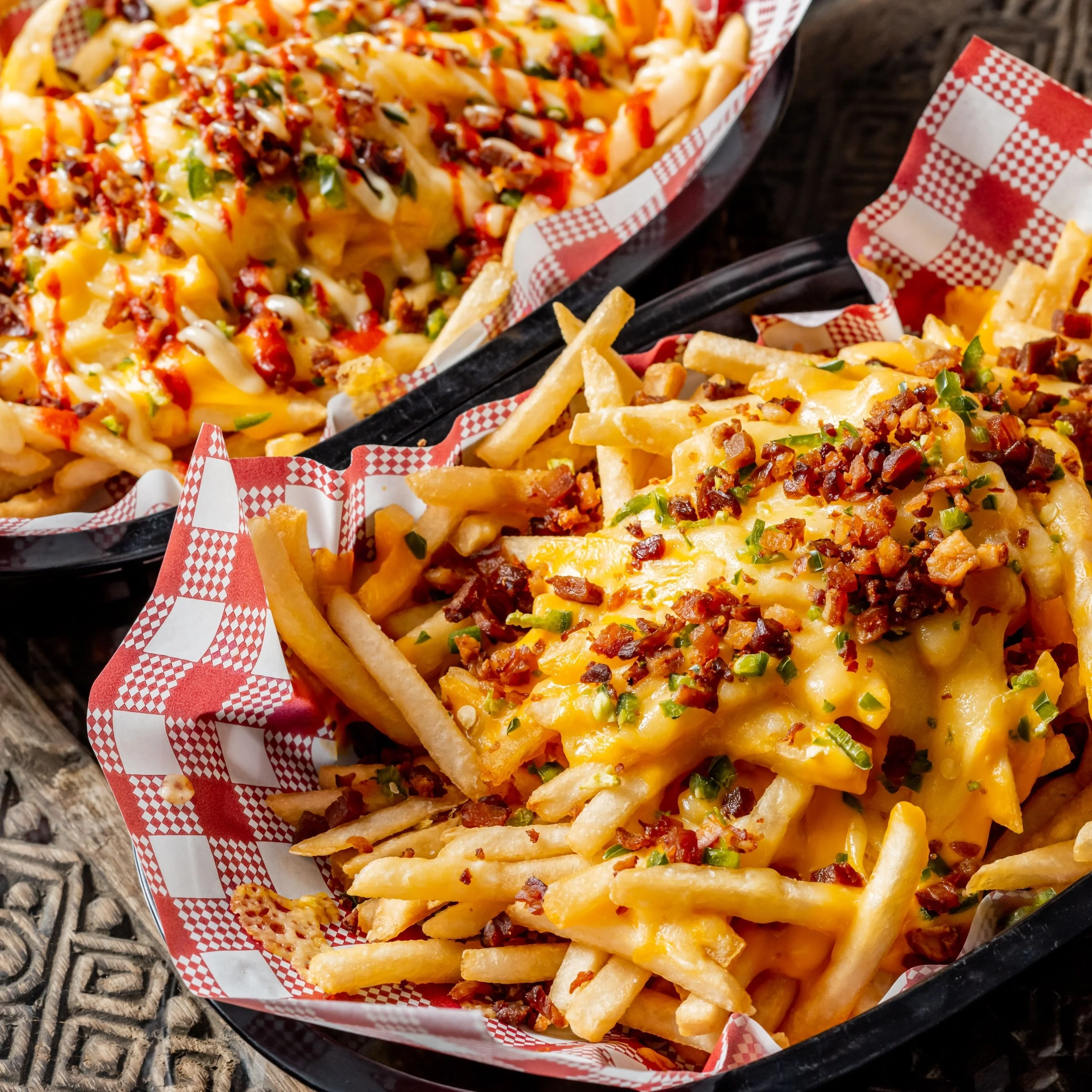 Loaded cheese fries with bacon and green onions