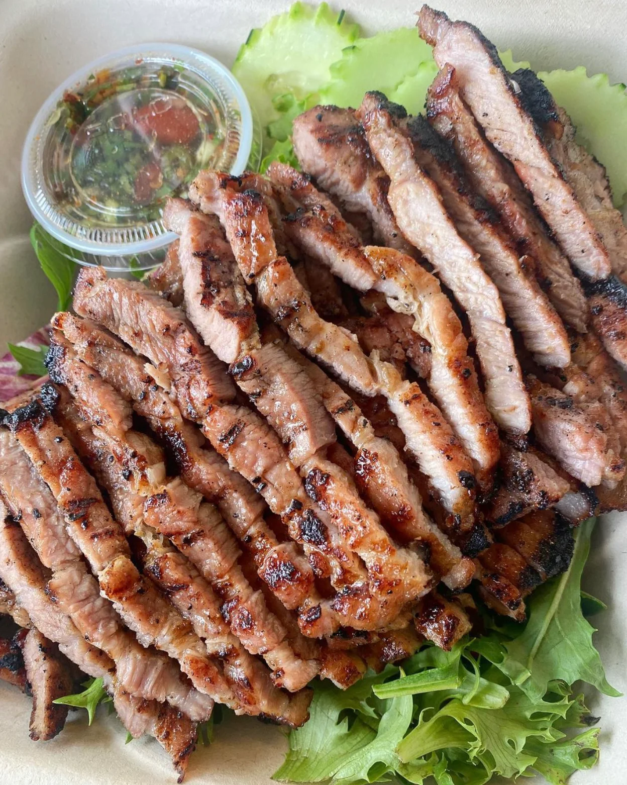 Grilled Vietnamese beef skewers with dipping sauce