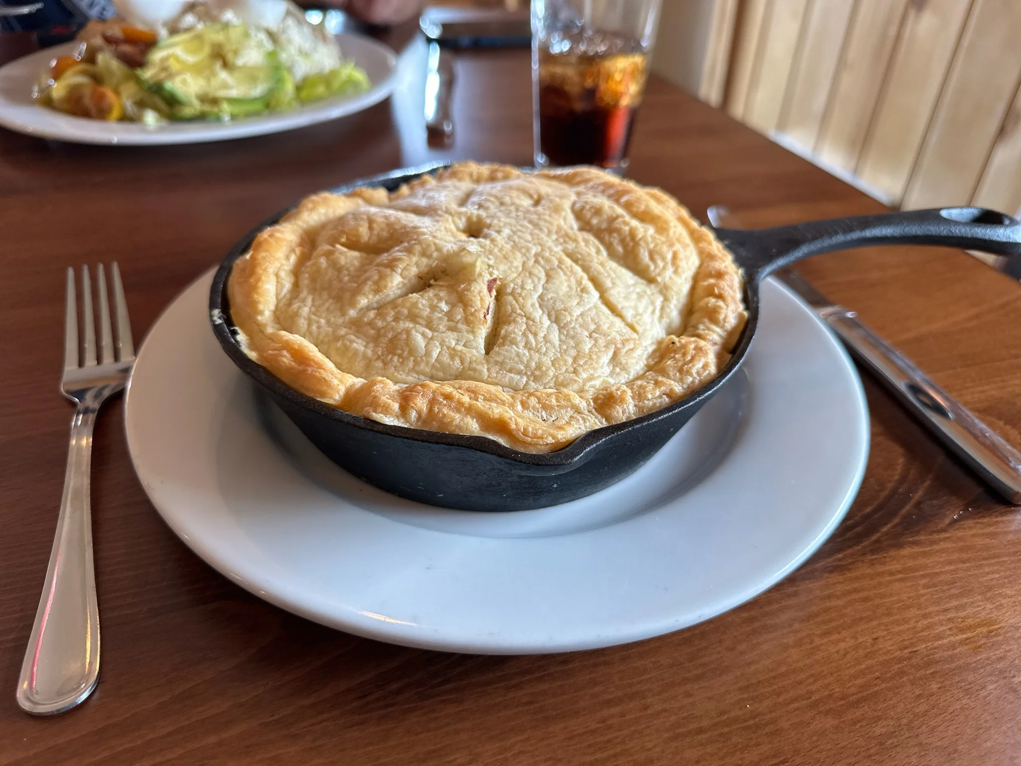 Savory chicken pot pie in a cast iron skillet