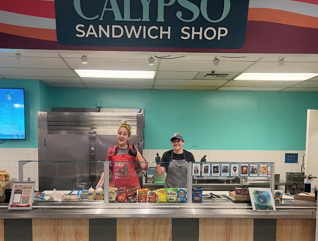 Friendly staff at Calypso Sandwich Shop serving fresh sandwiches