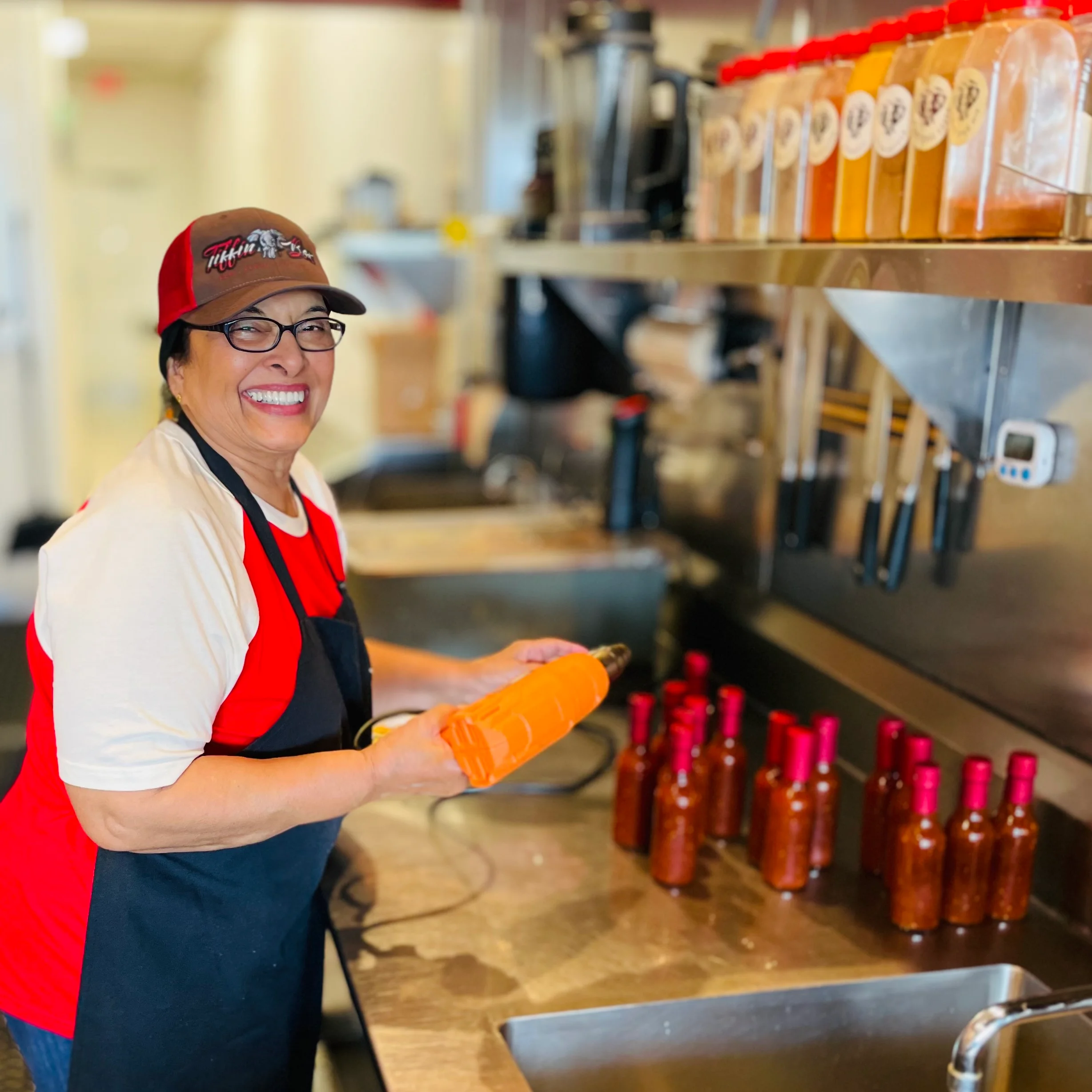 A woman working at Tiffin Box
