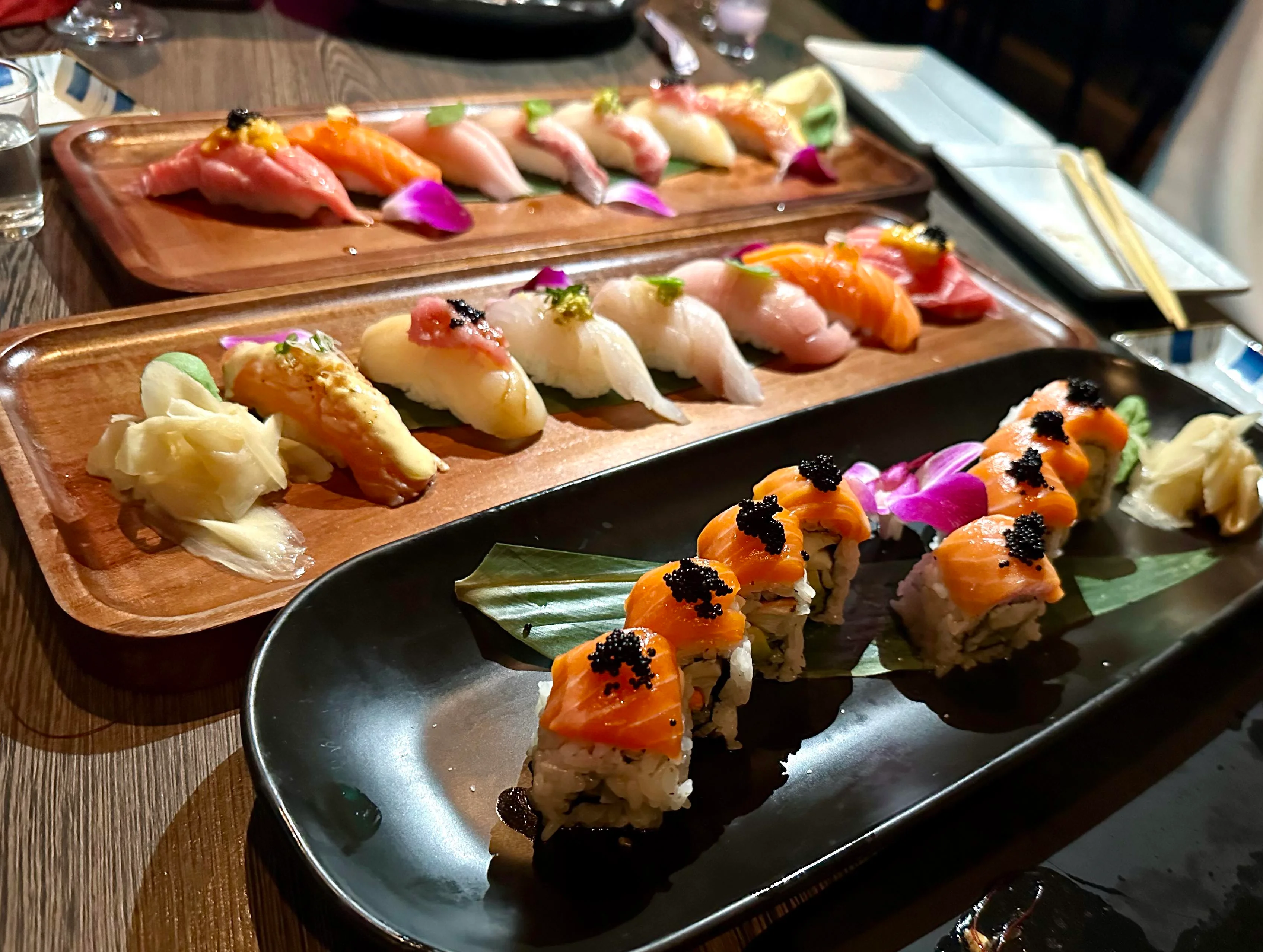 Assorted sushi platter featuring nigiri and rolls