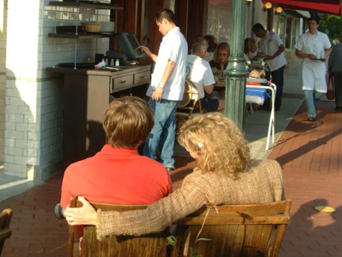 Couple enjoying a cozy moment at a restaurant patio