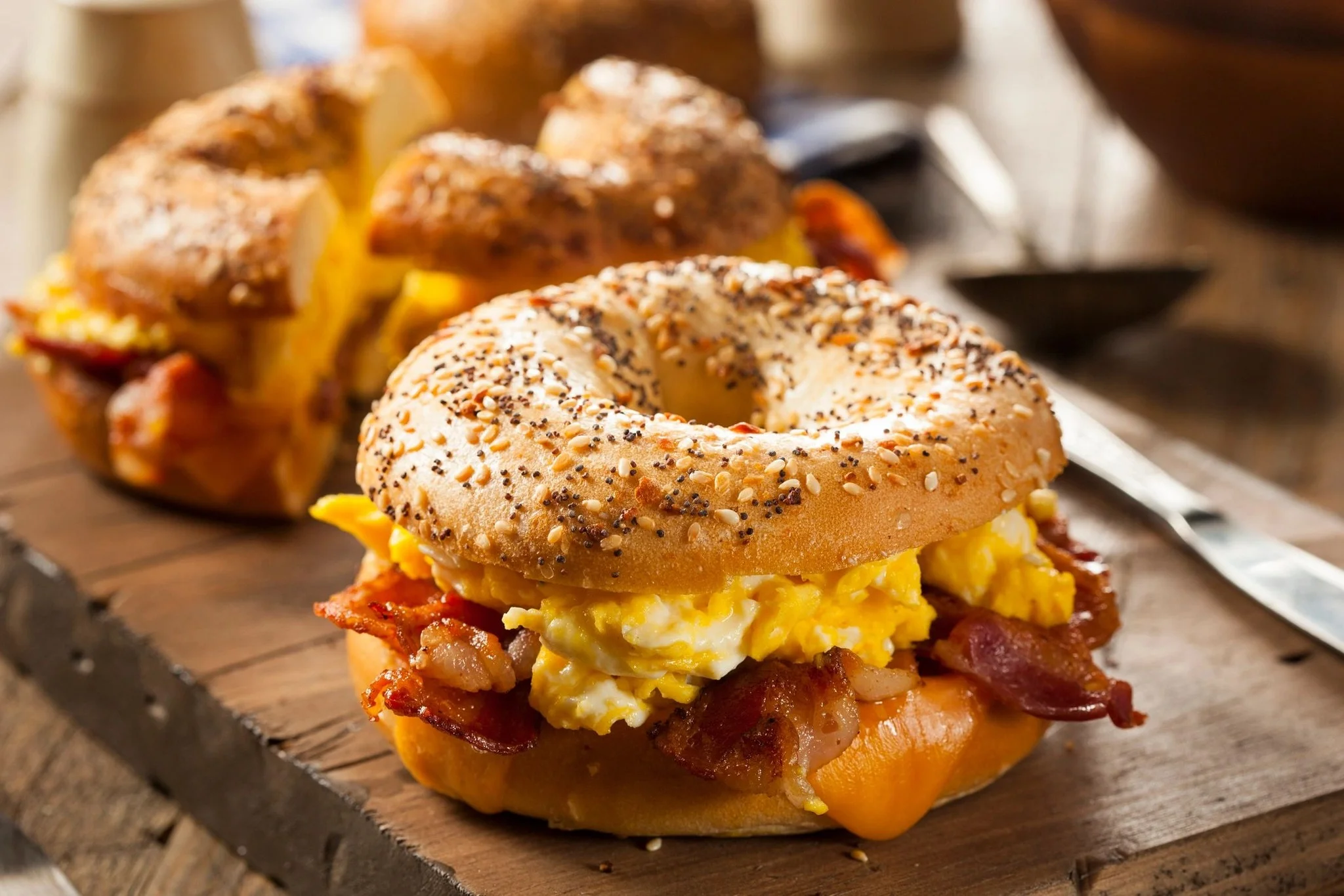 Bagel sandwich with bacon and scrambled eggs