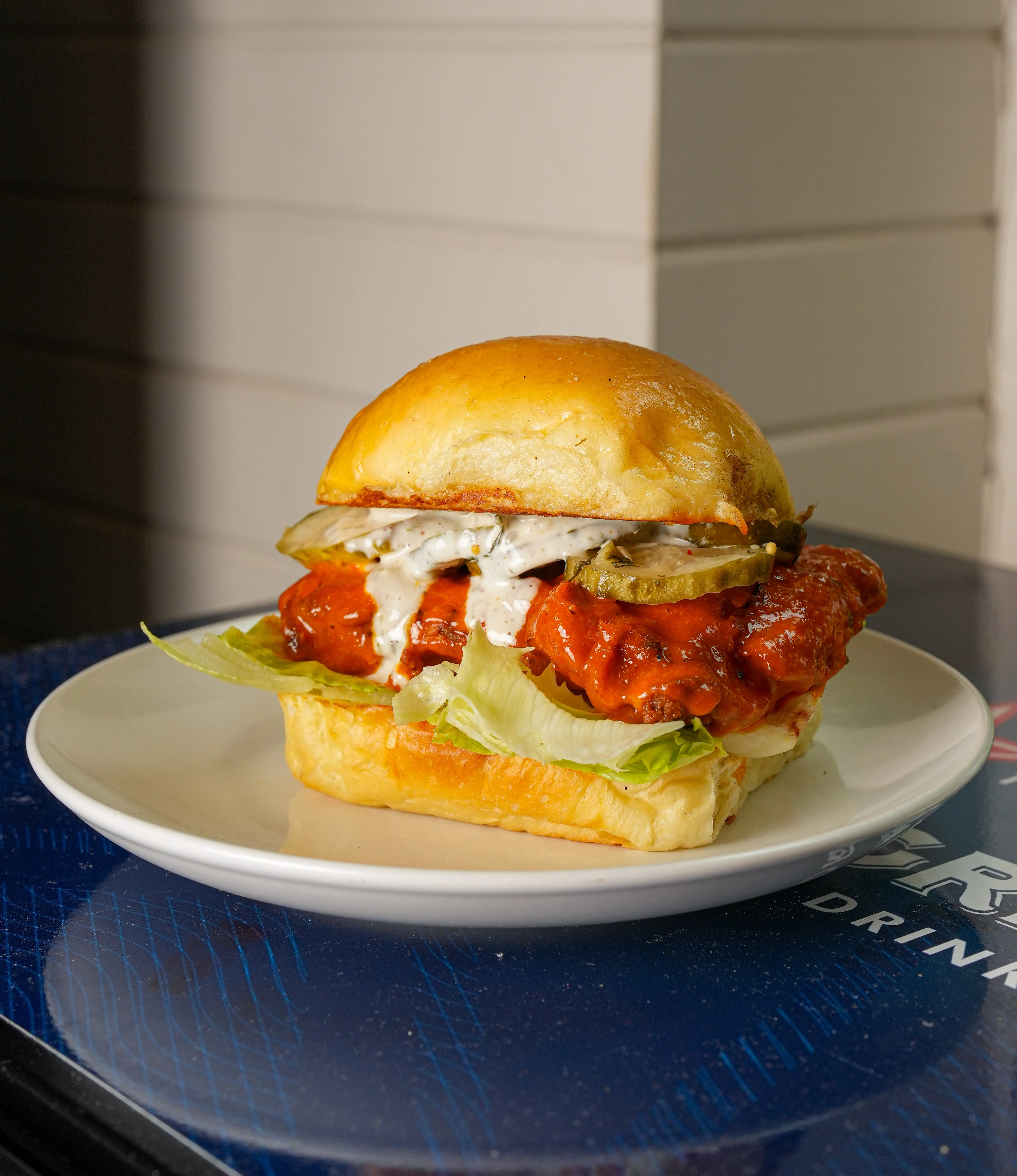 Spicy buffalo chicken sandwich with pickles