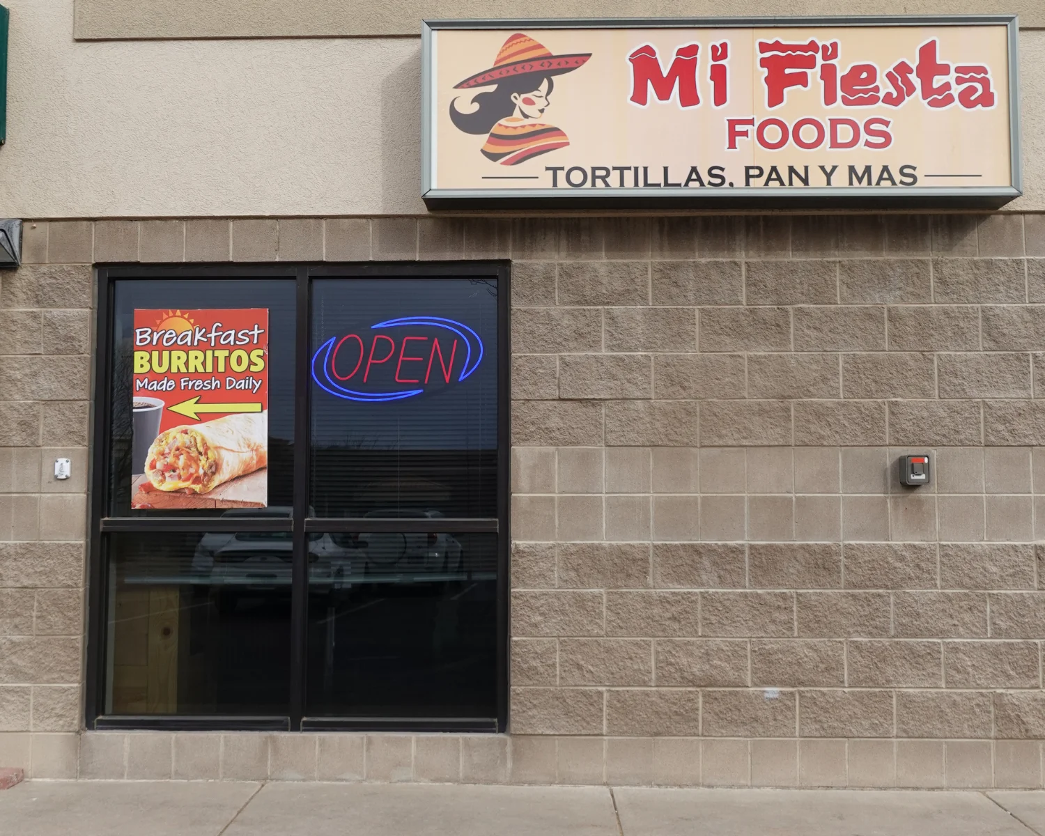 Exterior of Mi Fiesta Foods with breakfast burrito sign