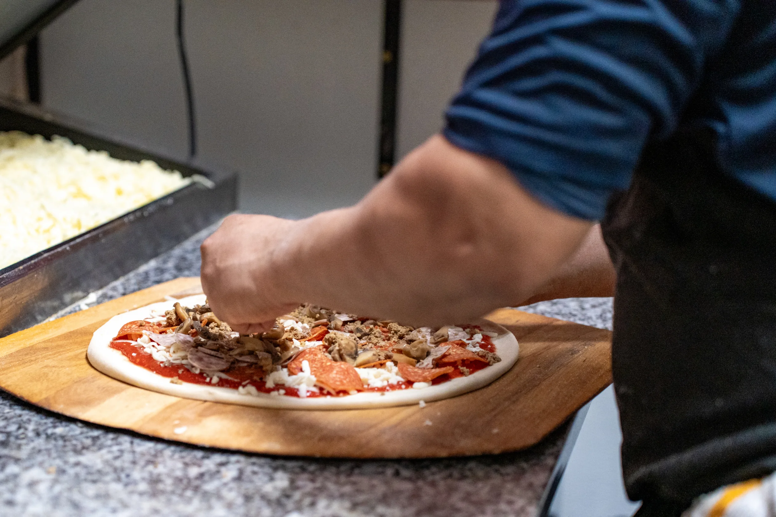 A restaurant chef preparing a dish