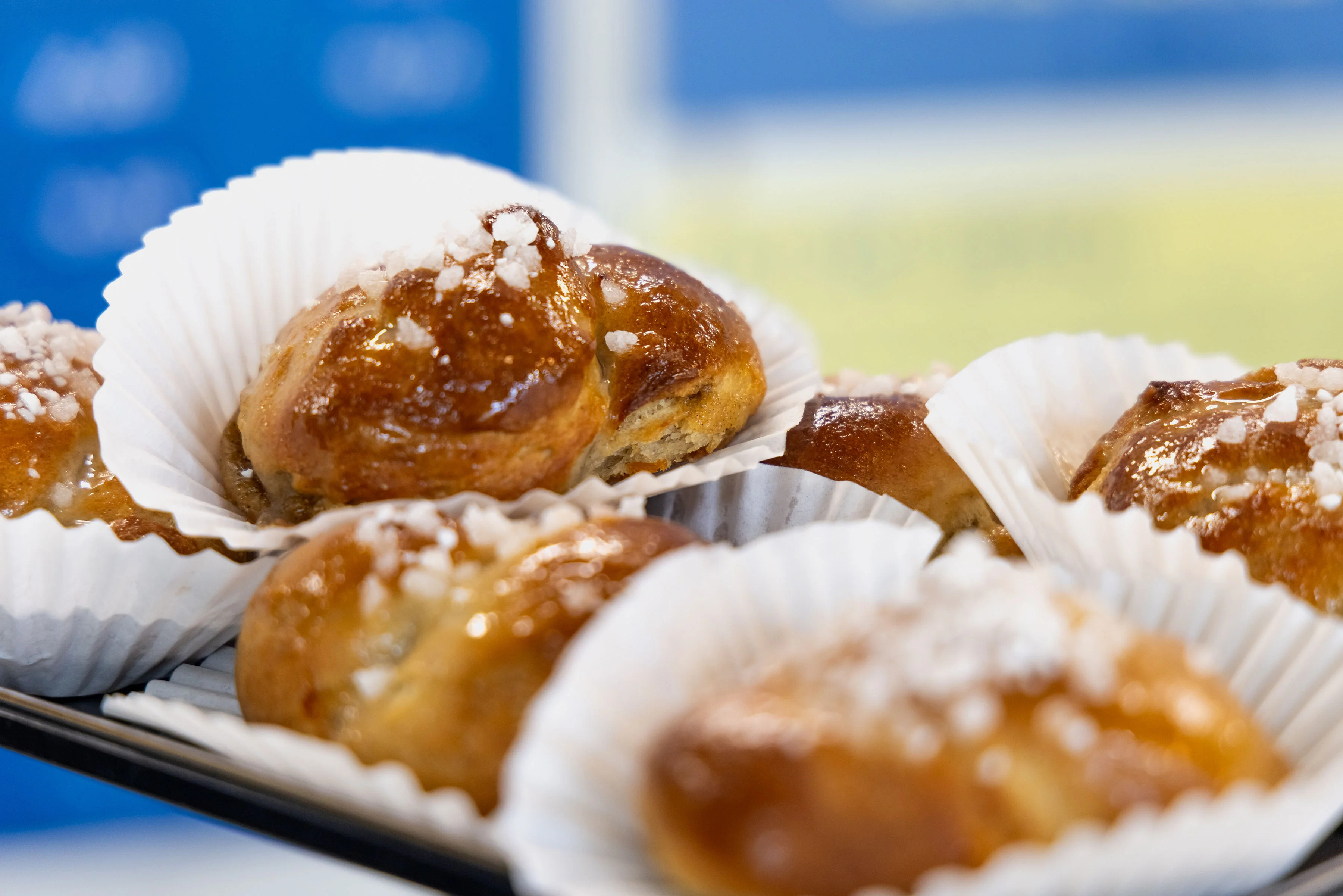 Freshly baked Swedish kanelbullar with sugar topping