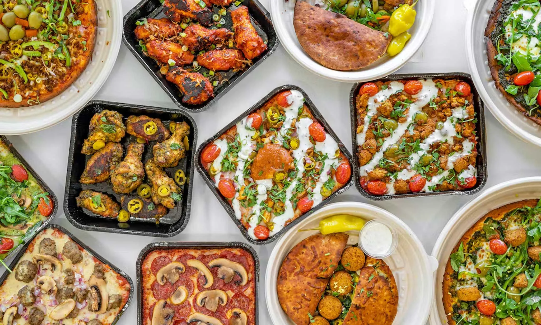 Assorted Mediterranean dishes including kebabs and flatbreads