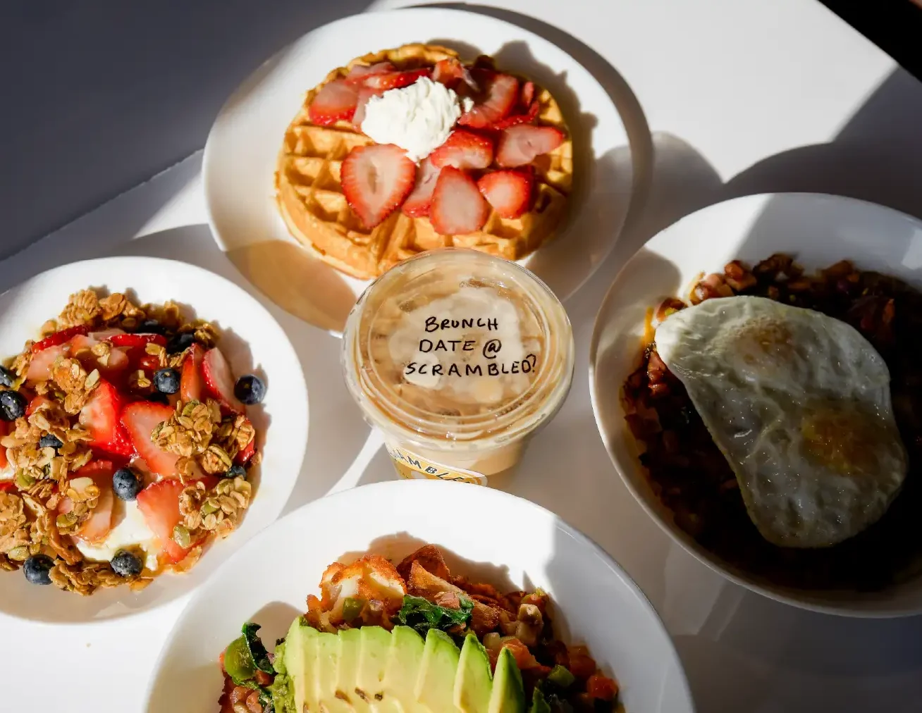 Weekend brunch at Scrambled Breakfast & Lunch featuring waffles, breakfast burritos, coffee, and family dining in Utah.