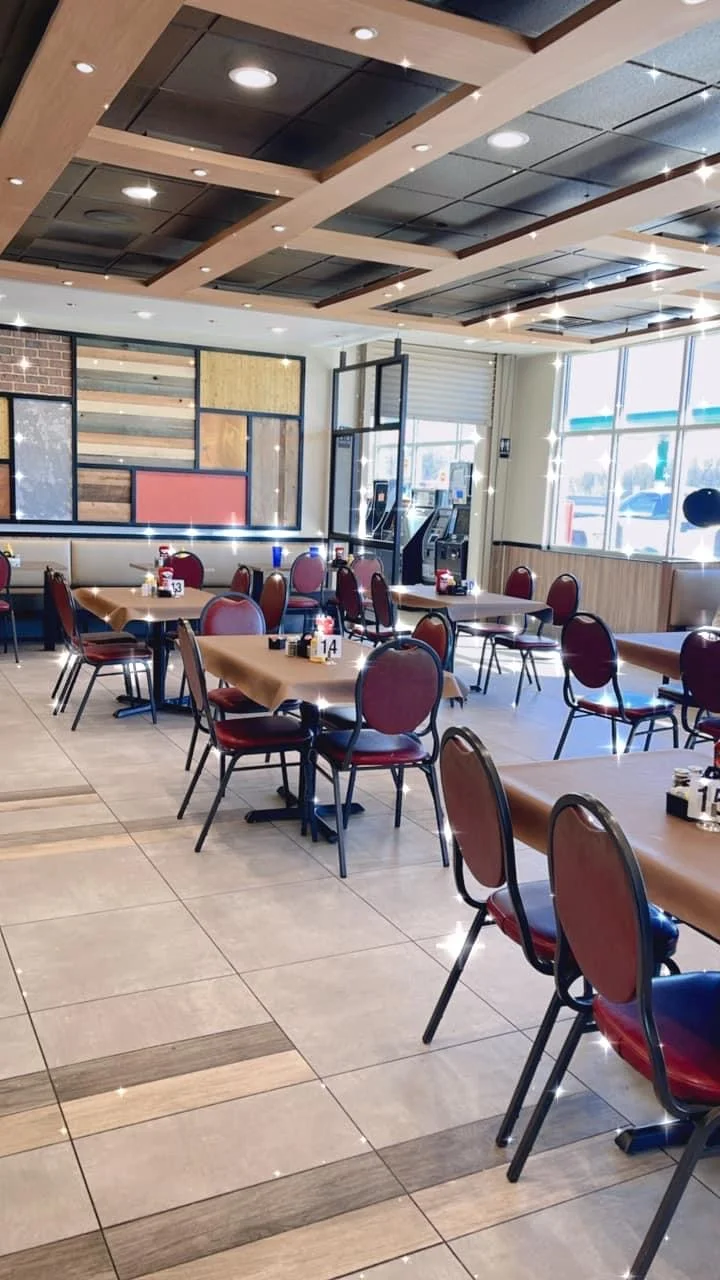 Cozy restaurant interior with modern decor and ample seating
