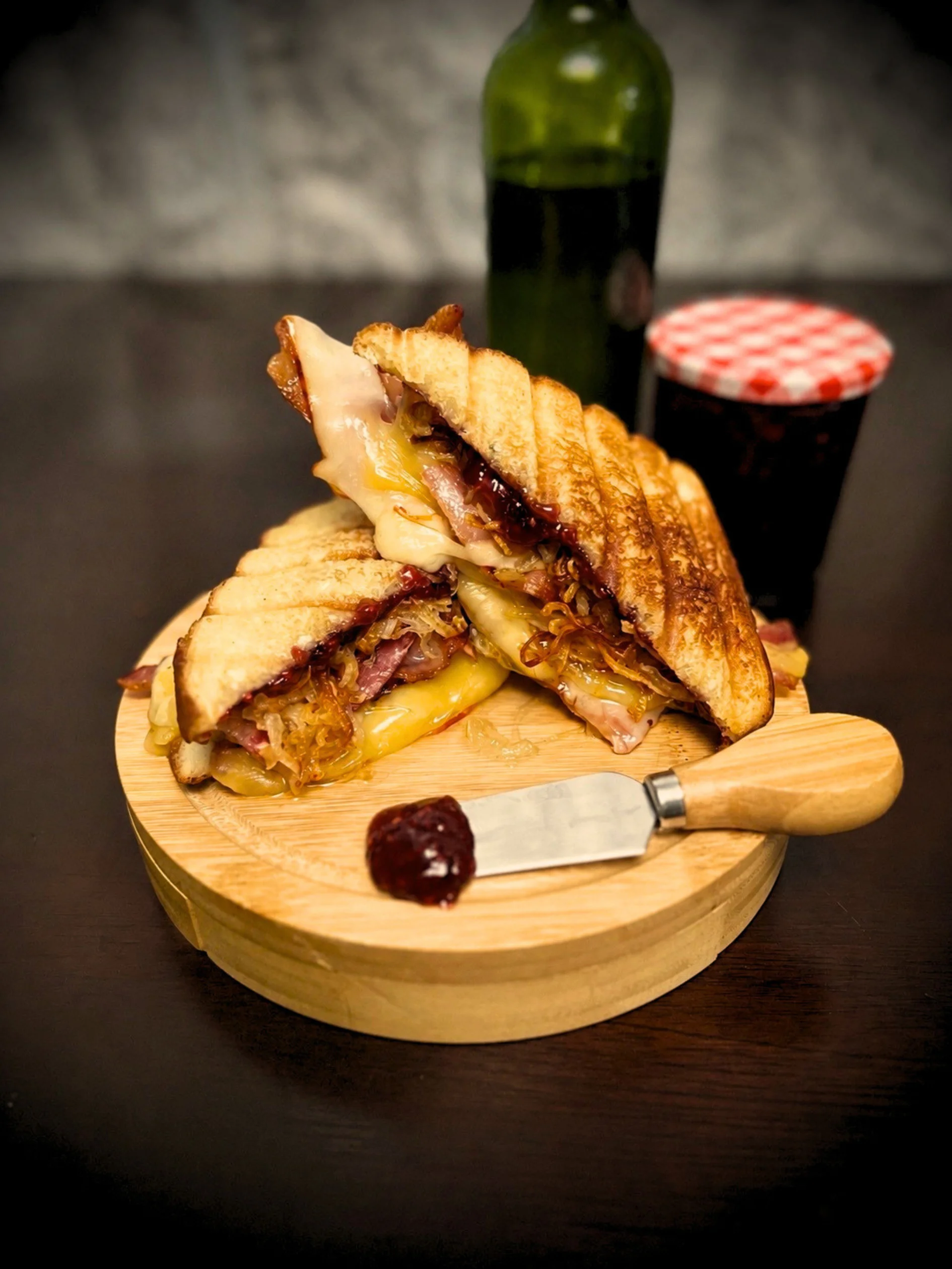 Grilled ham and cheese sandwich with fresh tomatoes