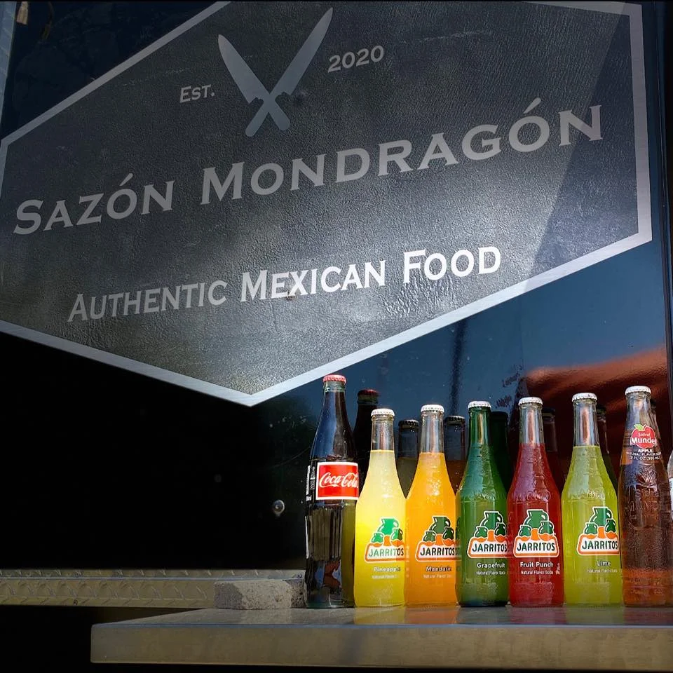 Sazón Mondragón sign with Mexican sodas