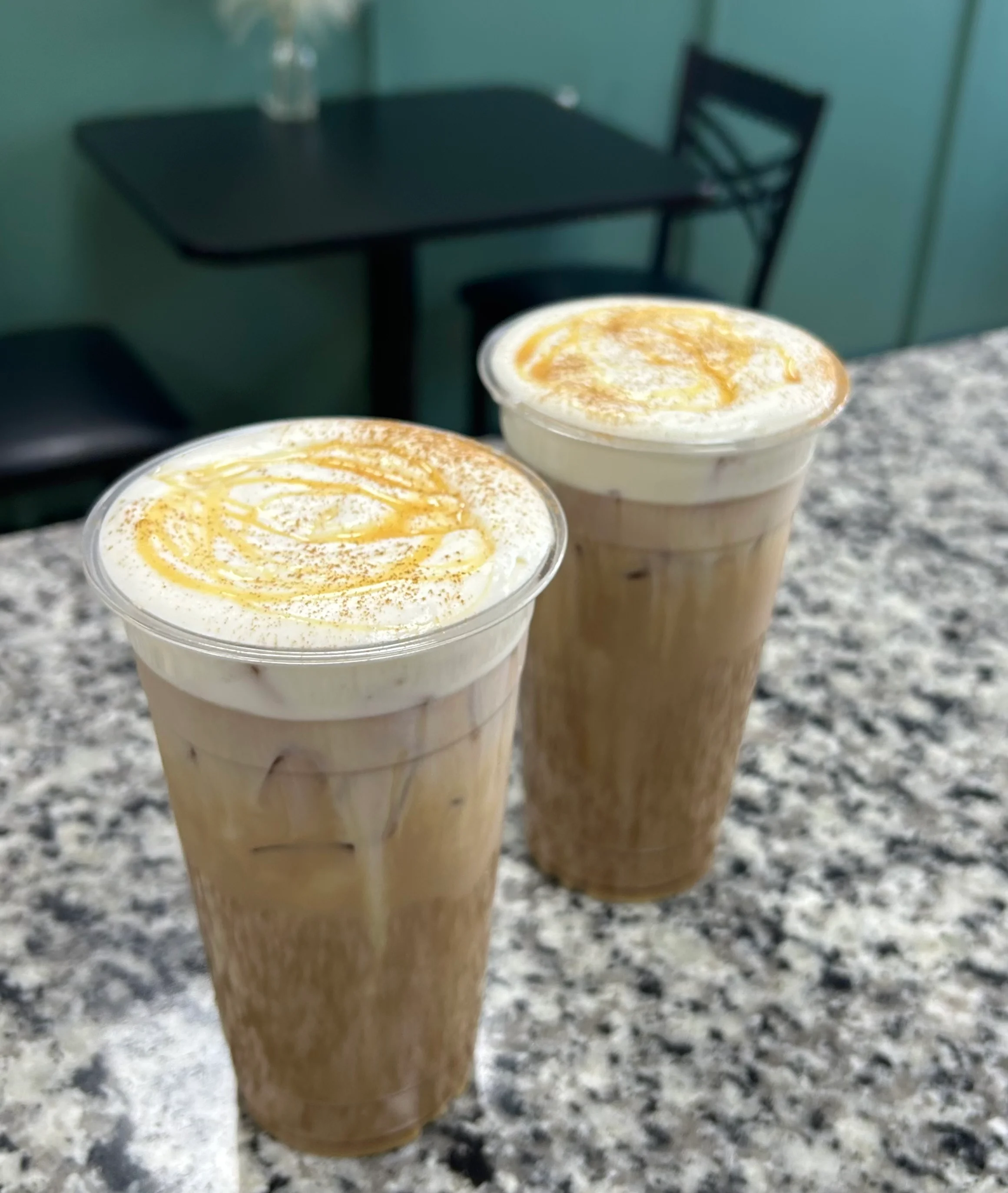 Iced caramel macchiato with whipped cream