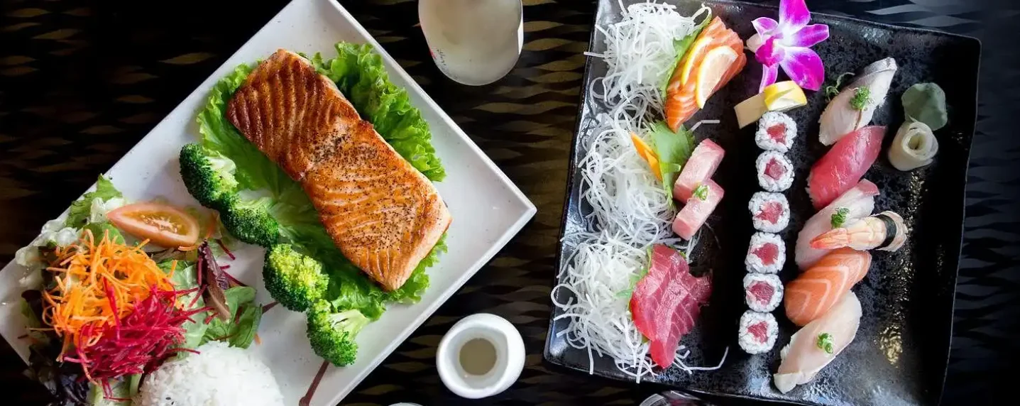 Japanese sushi platter with fresh sashimi and grilled salmon
