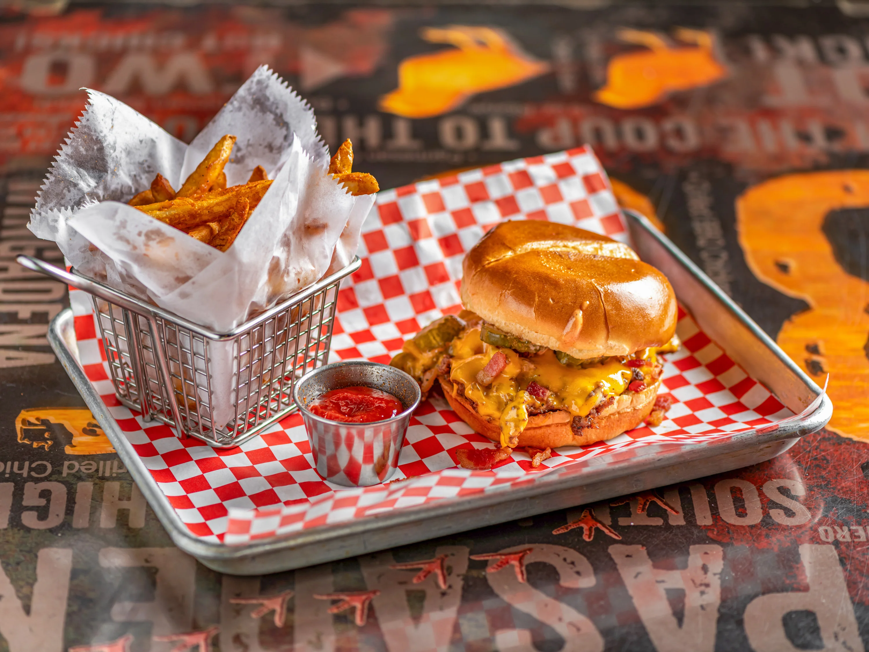 Cheeseburger with fries in a casual dining setting