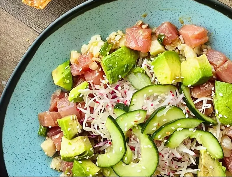 Crispy nachos topped with fresh salsa and avocado