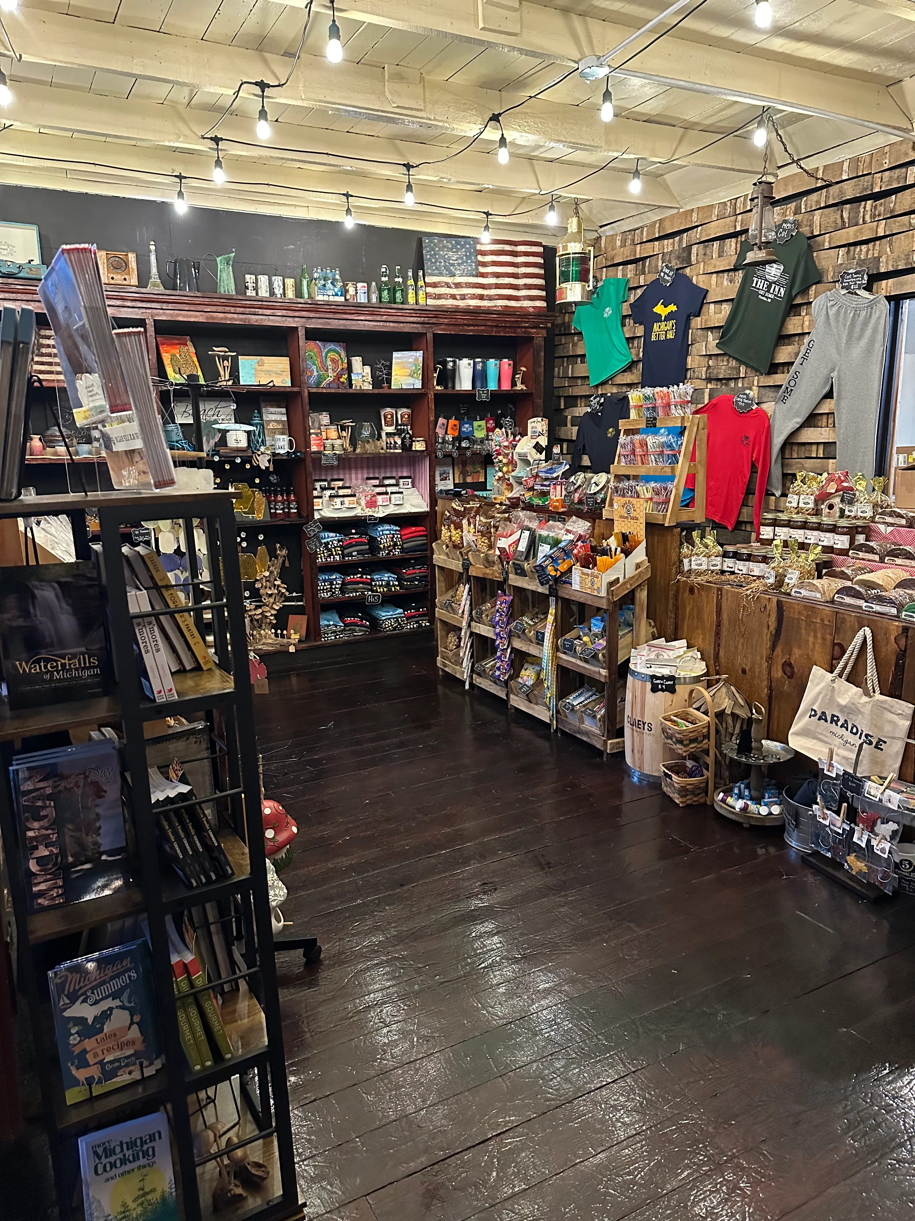 Charming gift shop interior with rustic decor and various merchandise
