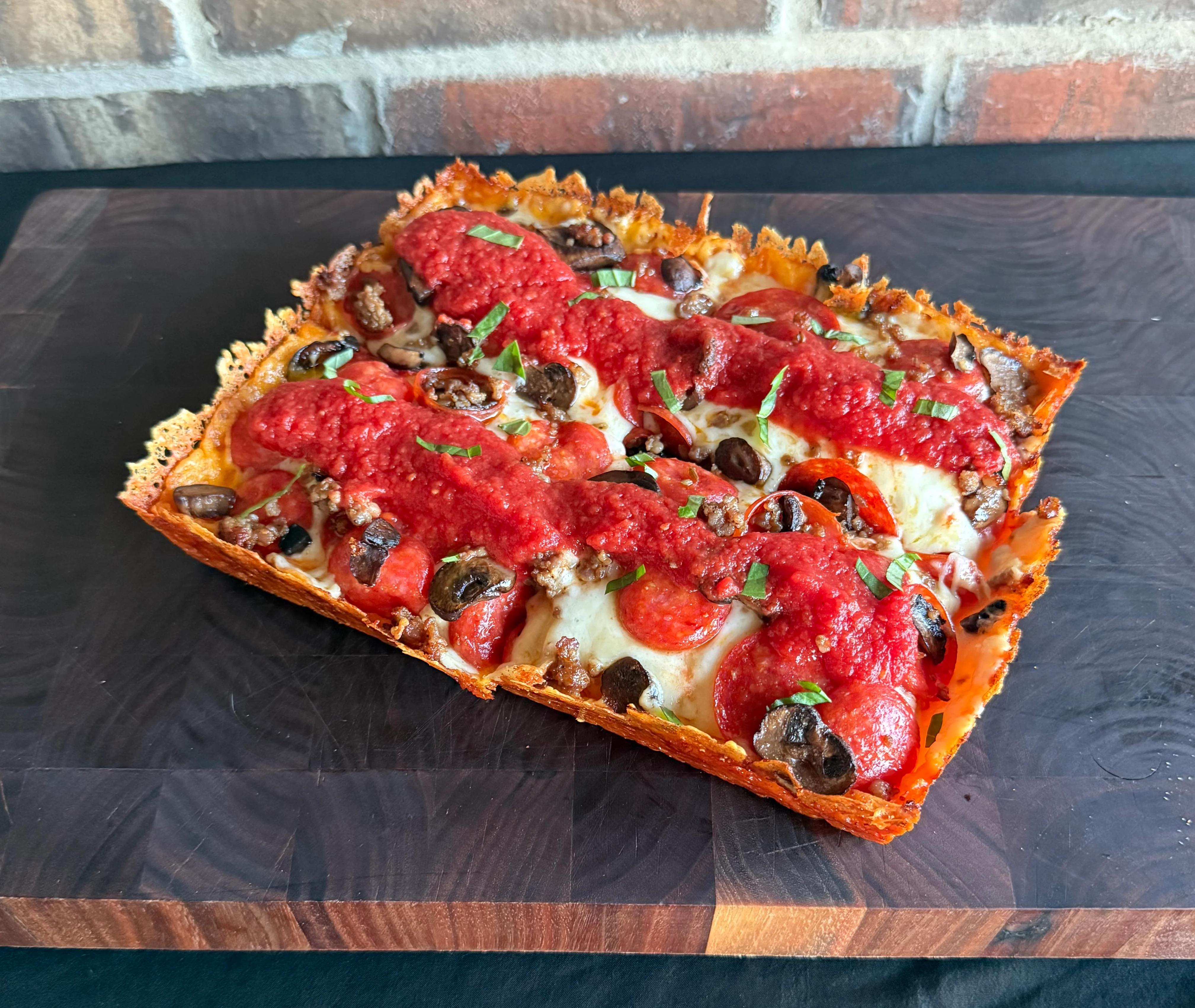 Chicago-style deep dish pizza with rich tomato sauce