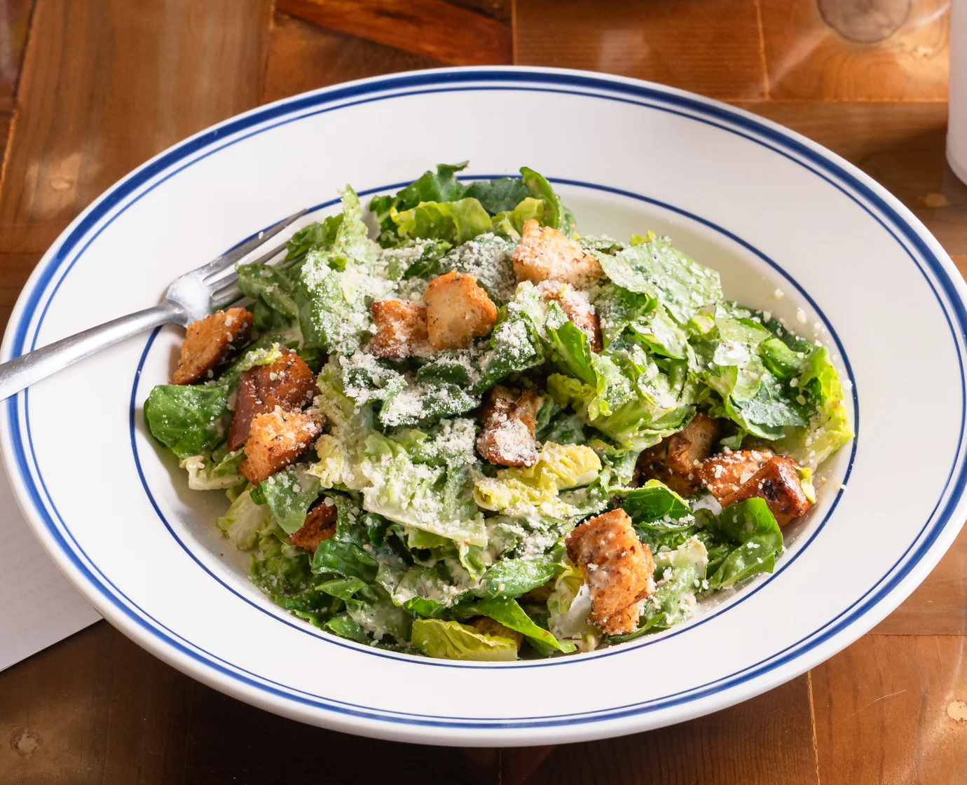 Fresh salad with vibrant vegetables and greens in a bowl