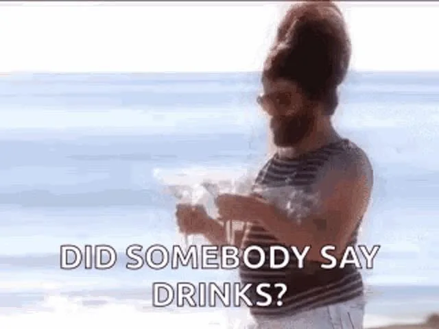 Person on beach excited about drinks