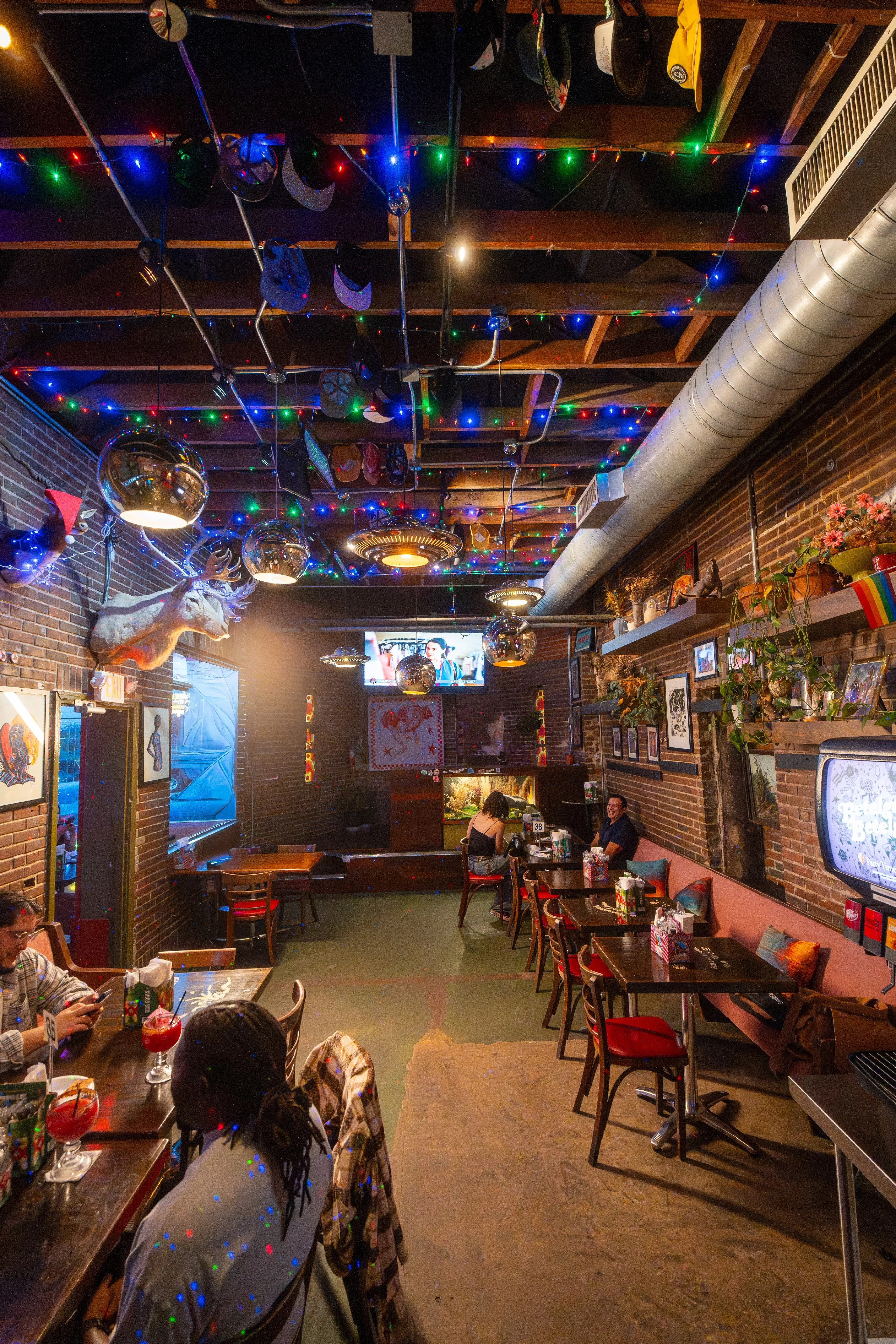 Cozy restaurant interior with colorful lights and unique decor