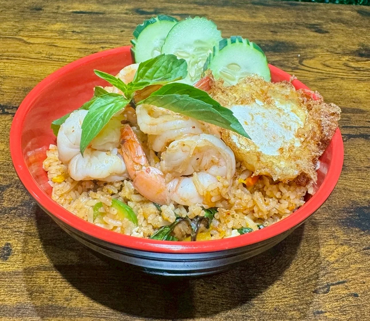 Shrimp fried rice with egg and fresh herbs