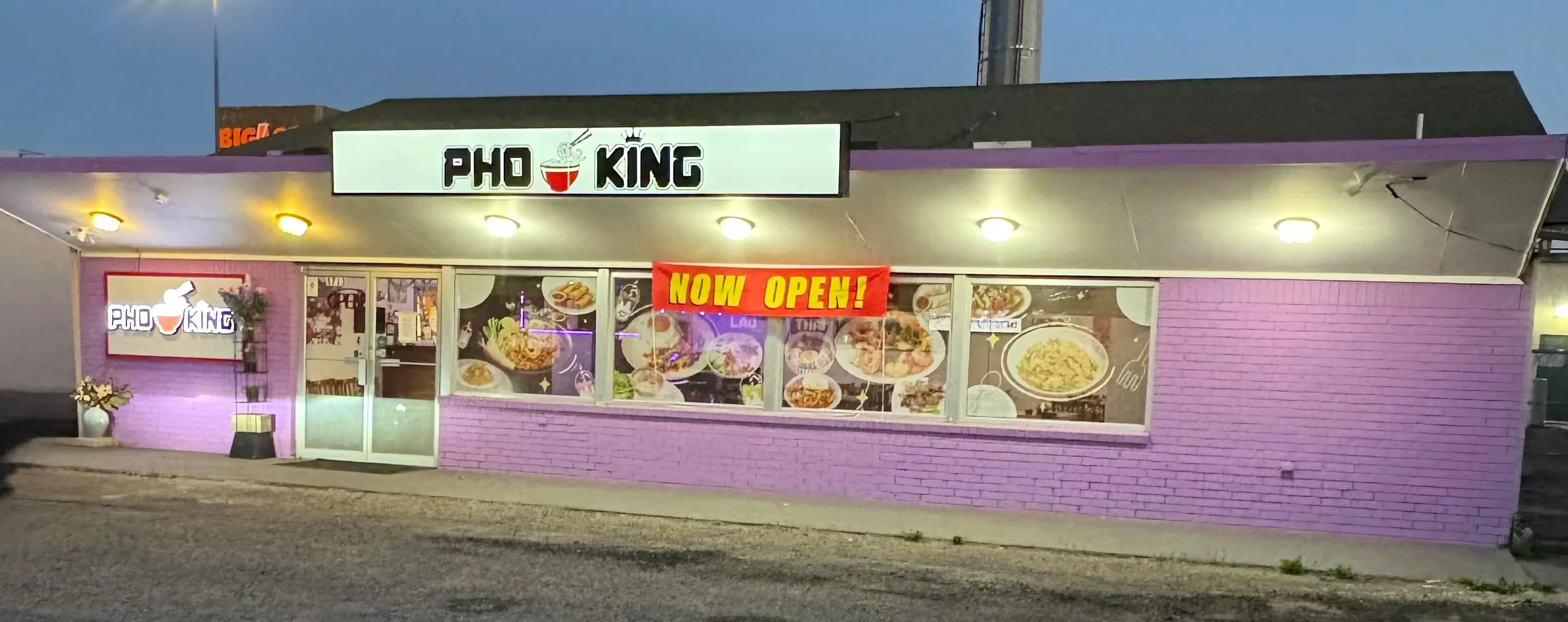 Exterior of Pho King restaurant with vibrant purple walls