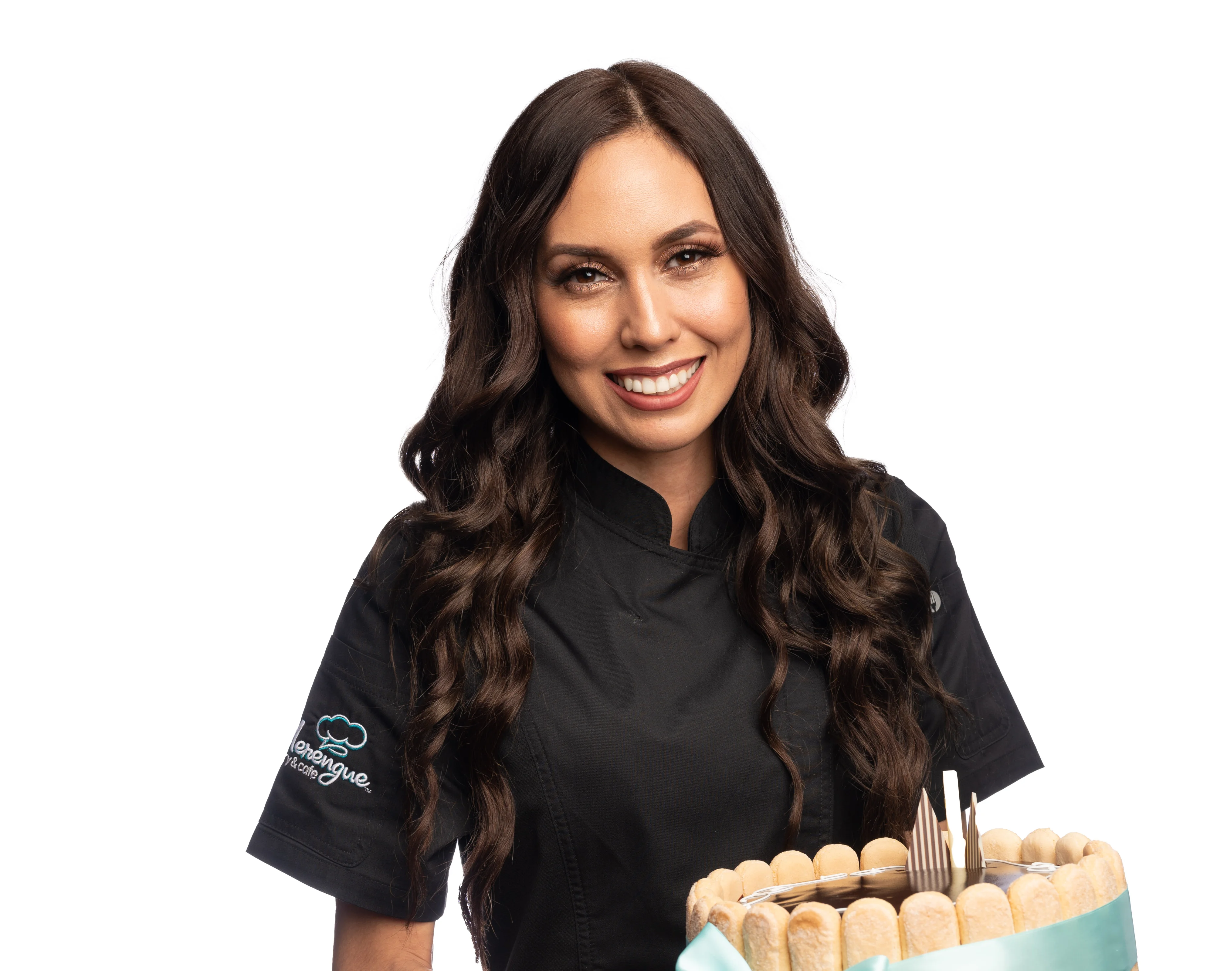 Pastry chef holding a beautiful charlotte cake with a ribbon