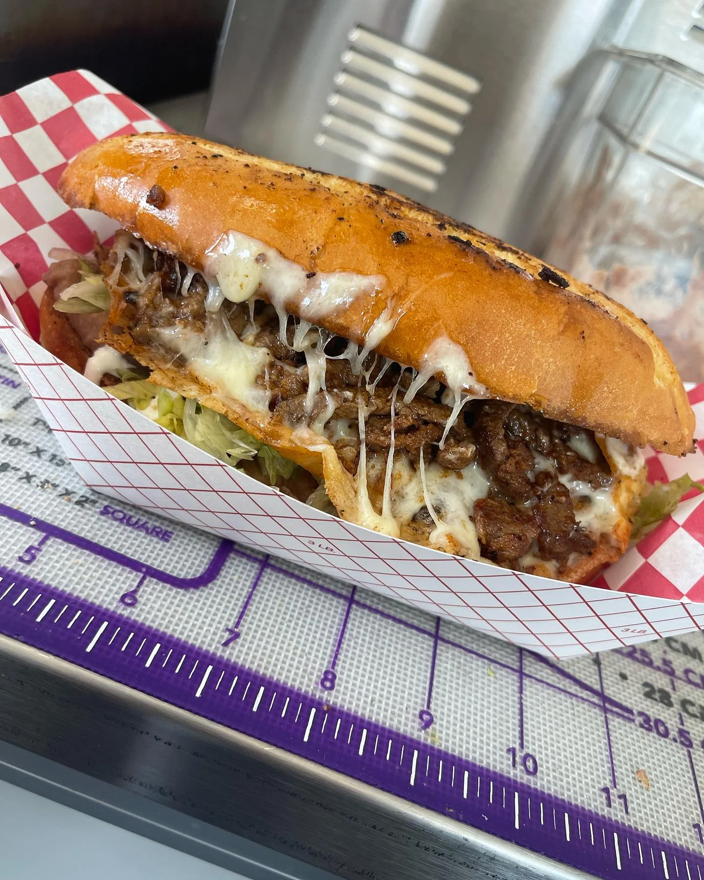 Melted cheese steak sandwich with savory beef