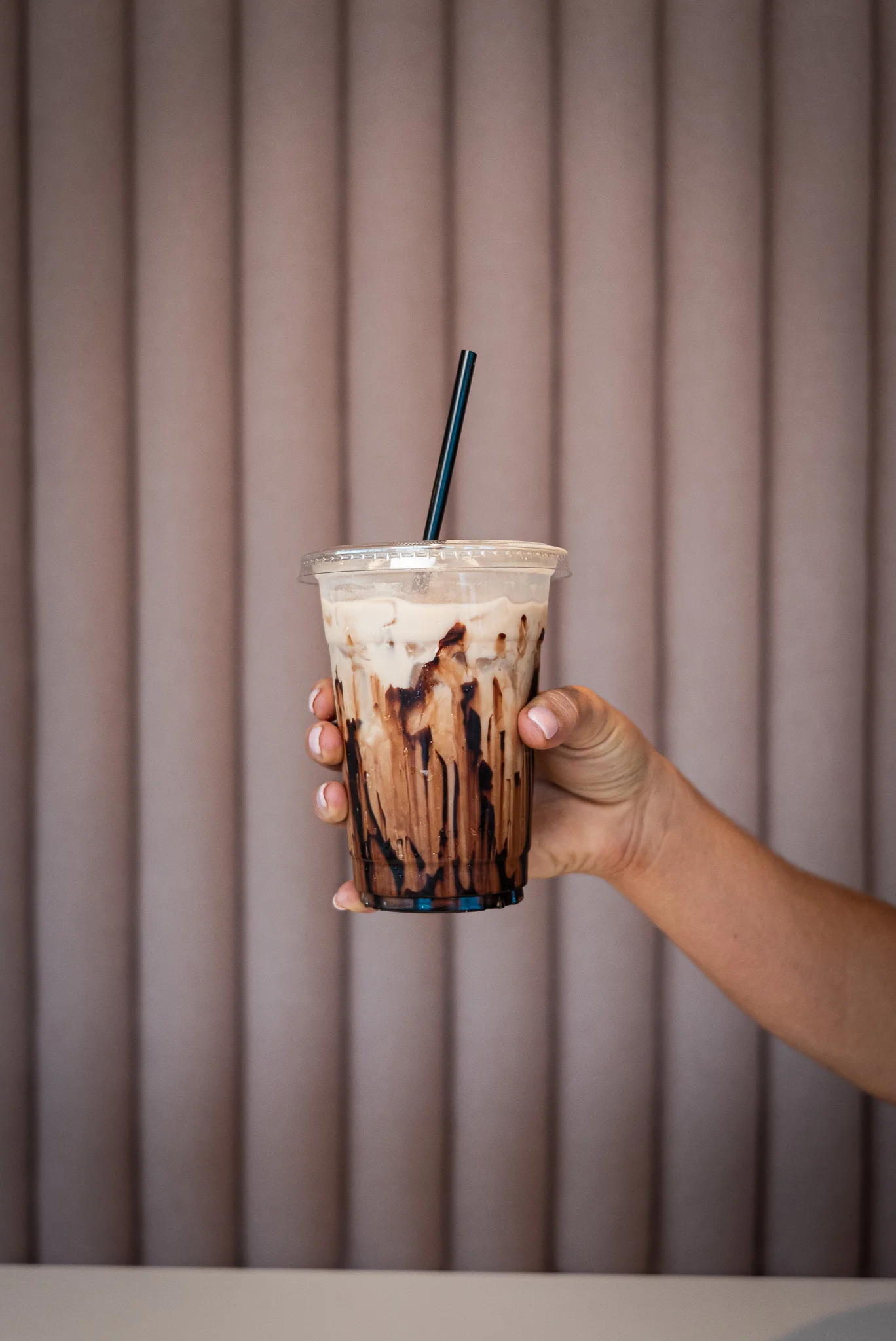 Iced chocolate drink with whipped cream
