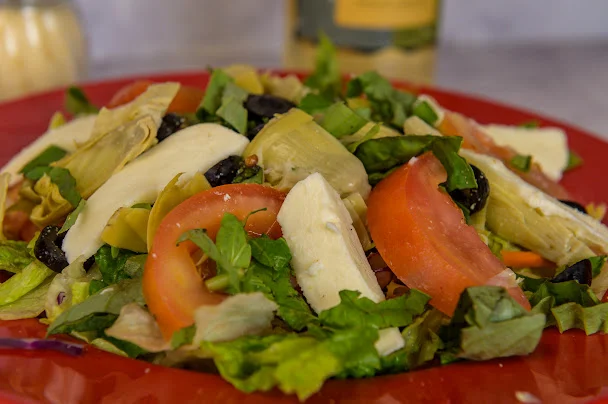 Fresh Mediterranean salad with artichokes and olives