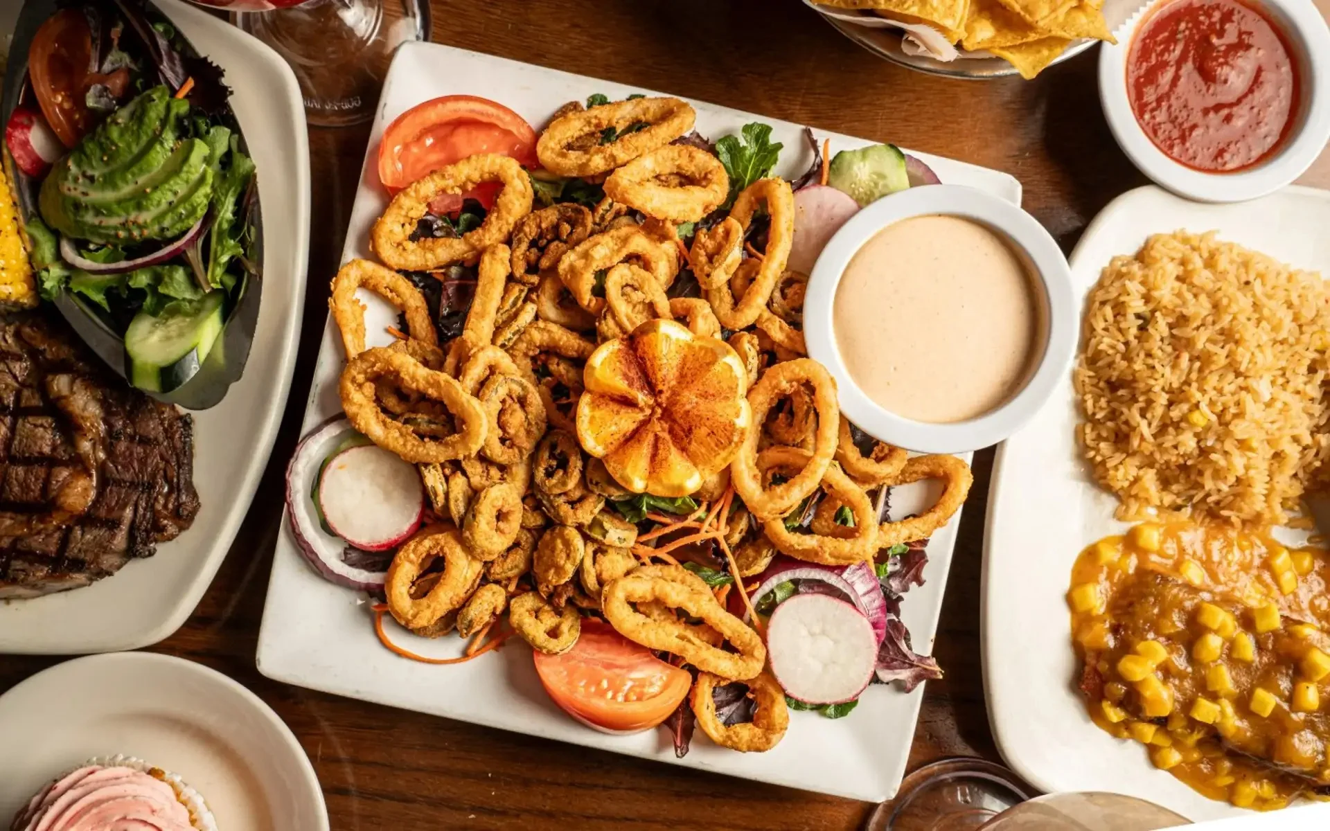 Delicious gourmet burger with fresh toppings on a wooden table