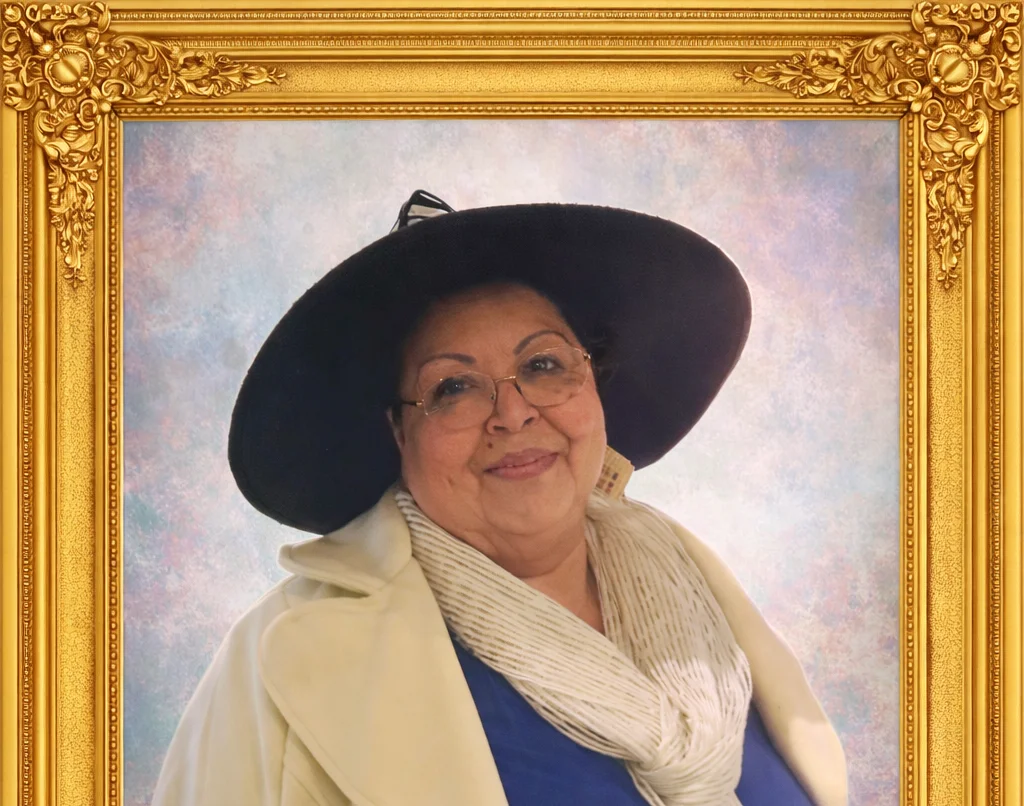 Portrait of a woman in a stylish hat and coat