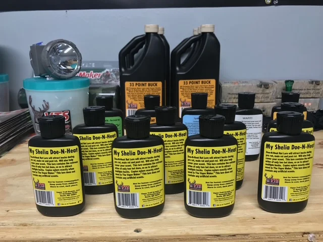 Bottles of deer attractant for hunting