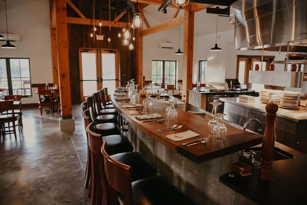 Cozy restaurant interior with wooden beams and modern decor