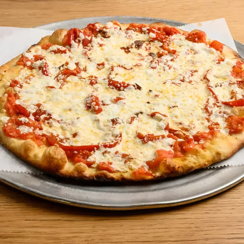 Freshly baked Margherita pizza on a silver platter