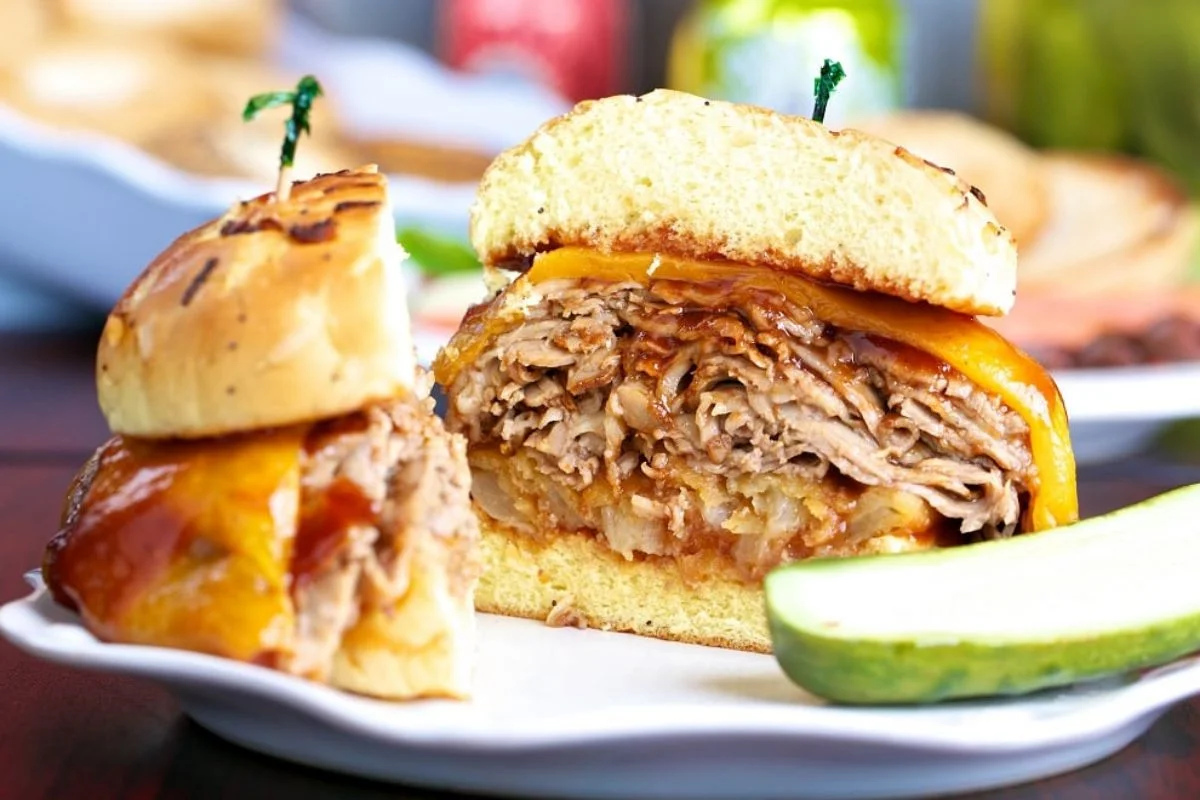 Pulled pork sandwich with cheddar and barbecue sauce