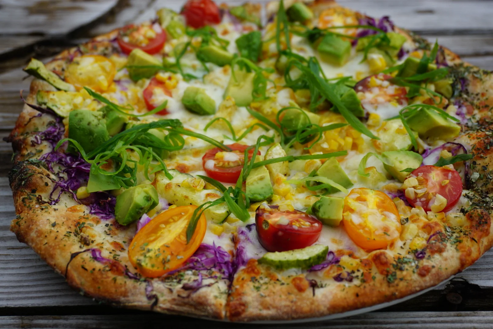 Colorful vegetarian pizza with fresh toppings