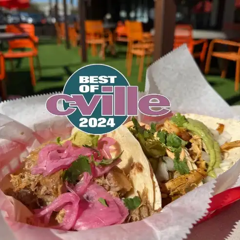 Two tacos with the Best of C-ville 2024 logo