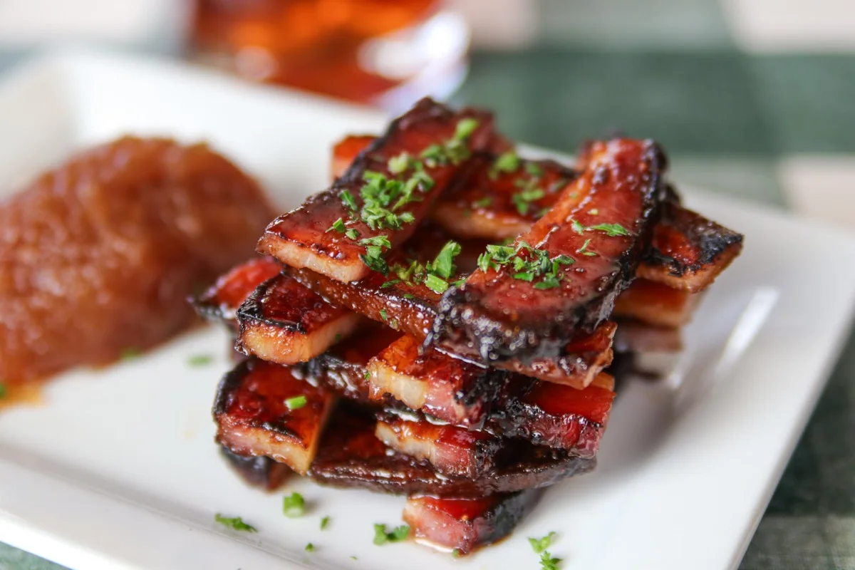 Crispy Chinese char siu pork slices with sauce